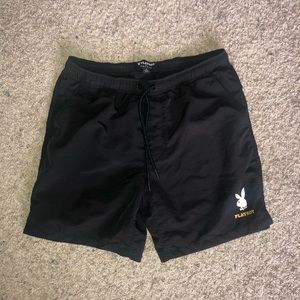Black playboy swim trunks